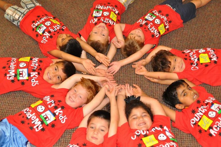 happy-children-lying-on-carpet-at-a-Preschool-Daycare-Serving-San-Antonio-TX