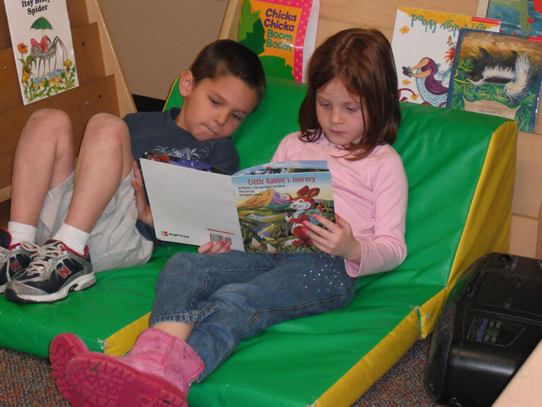 preschool-boy-girl-reading-book-at-a-Preschool-Daycare-Serving-San-Antonio-TX